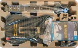 An image of Guitar Hero Live (Guitar Bundle) - Package.